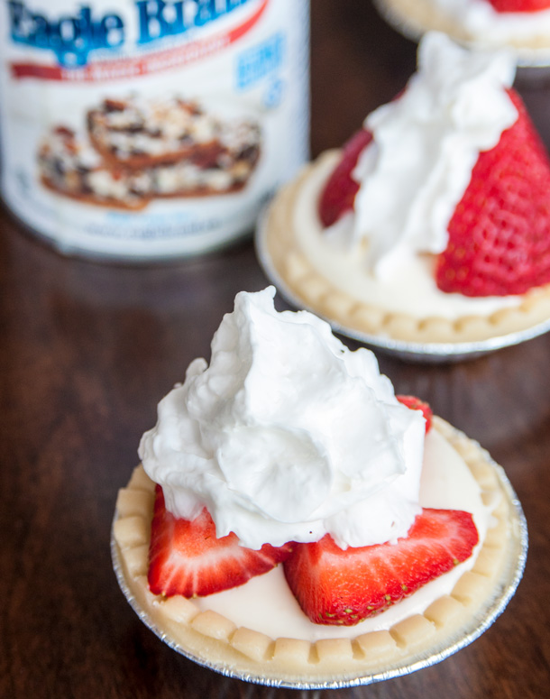 These cool, creamy No-Bake Strawberry Cheesecake Tarts will have you out of the kitchen and enjoying the hot days of summer faster than you can say "Who wants to lick the beaters?" | YMCFood | YummyMummyClub.ca
