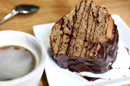 This Espresso Spiked, Chocolate Glazed, Chai Spiced Cake is the perfect storm of flavour that will knock your socks off. A great coffee cake for brunch, guests, or weekends! | YMCFood | YummyMummyClub.ca