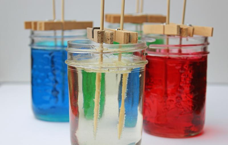 Growing your own rock candy sugar crystals is a delicious science experiment to do with kids. Only two ingredients are required to "grow" these sweet treats. Your kids will love making them! | DIY | Candy | YMCFood | YummyMummyClub.ca