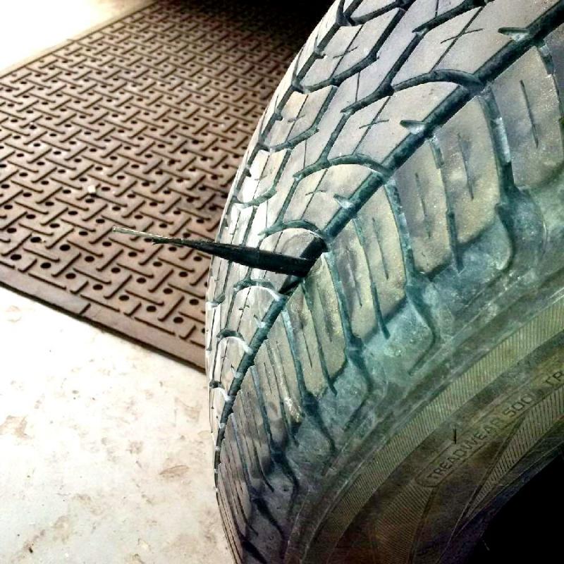 Tire plug and patch combination installed