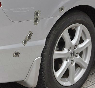 Car Accessory bullet holes