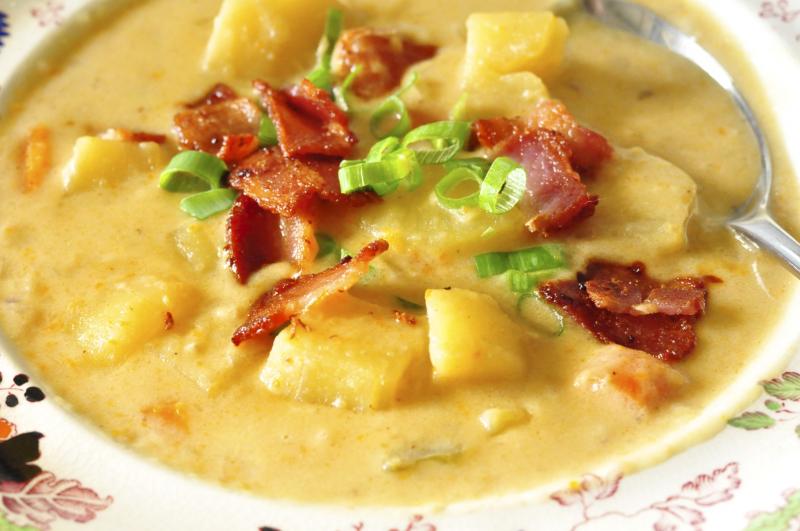 Potato, Cheddar and Guinness Soup served with bacon and green onions is the perfect comfort food 