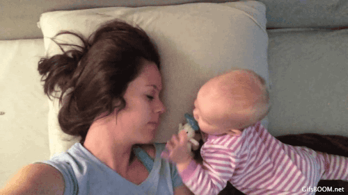 baby picking mother's nose