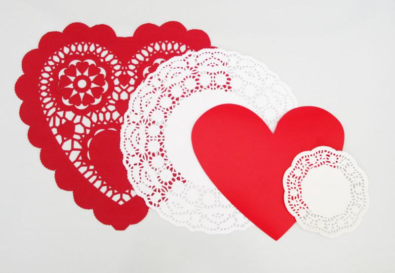 Layering doilies and heart cut-outs to make vintage Valentines