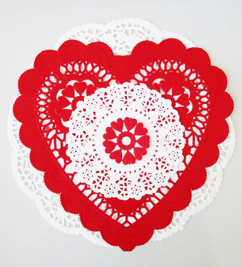 Layering doilies and heart cut-outs to make vintage Valentines. Easy activities for kids.