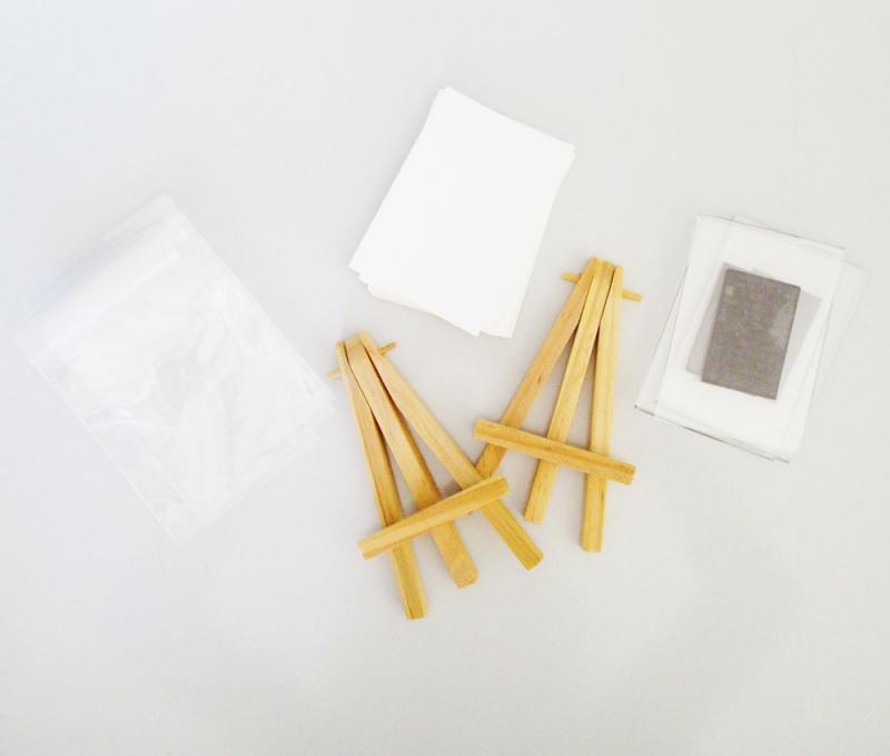 Accessories for artist trading cards include mini easels, little bags and magnetic frames.