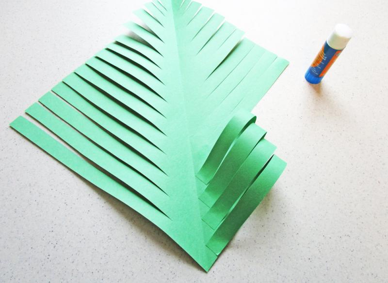 Fold the strips of paper into the centre.