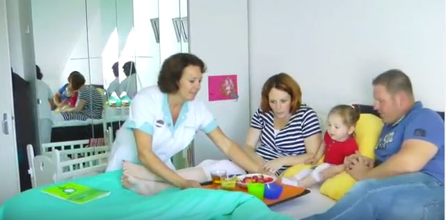 Ducth maternity nurses feed new mothers breakfast in bed.