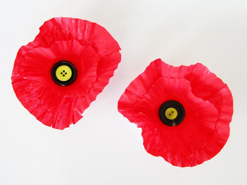 Craft poppies with muffin liners, paint and buttons.