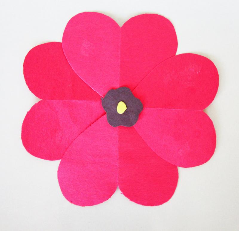 This poppy was made using construction paper.