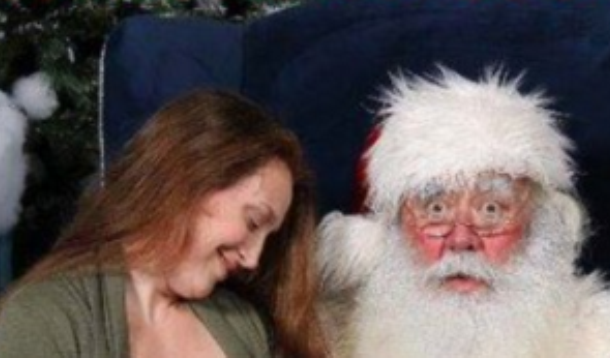 Mom nursing baby on Santa's lap | YummyMummyClub.ca 