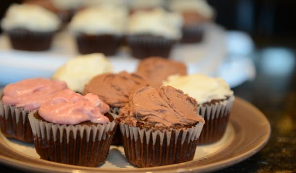 chocolate cupcakes with various frostings