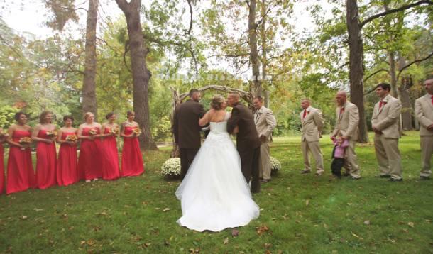 Father of the bride makes loving gesture 