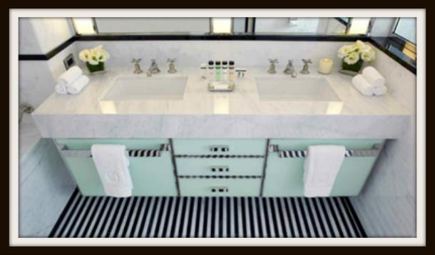 The Mark Hotel bathroom in mint and black.