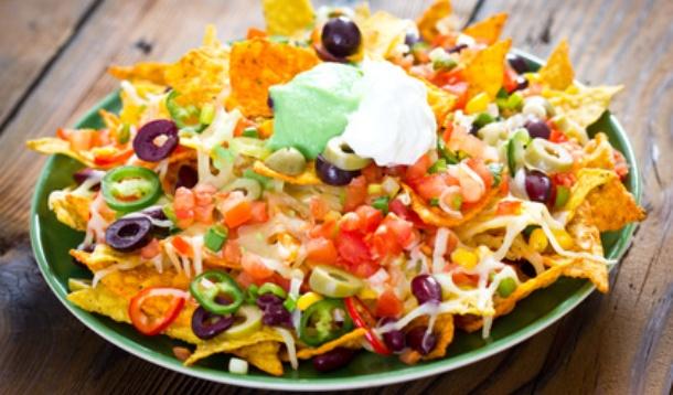 Everybody loves nachos, but they're a high-calorie, low-nutrition treat. These tips will make your nachos a better-for-you treat, so you can indulge without guilt! | Nutrition | YMCFood | YummyMummyClub.ca