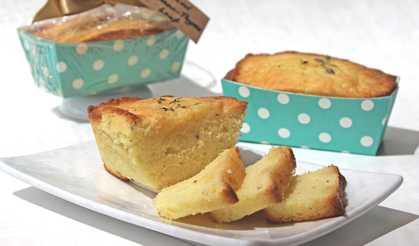 This quick-to-make Glazed Lemon-Thyme Loaf recipe is full of bright, lemony flavour. The addition of fresh thyme leaves to the loaf of bread makes it extra-special. Perfect as a gift, or for a tea party! | YMC