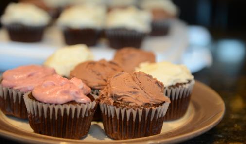 chocolate cupcakes with various frostings
