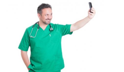 Doctors taking selfies with patients