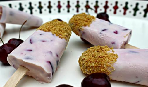 Frozen cherry cheesecake popsicles are a delicious summer treat