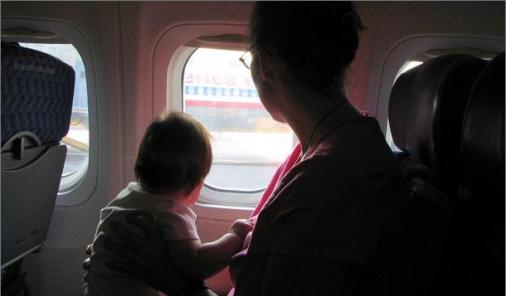 baby flying on plane