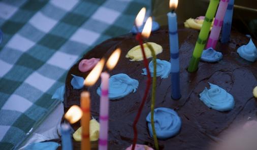 birthday cake with lit candles