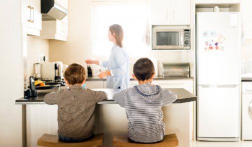 Mom In Kitchen With Two Boys