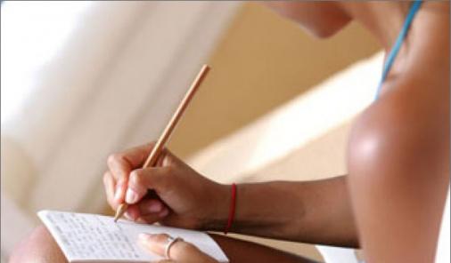 woman writing a journal
