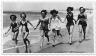 Retro women in bathing suits on the beach