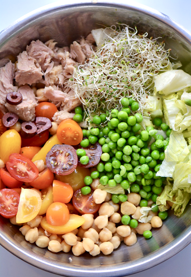 This easy Tuna and Vegetable Salad recipe is a hearty dish filling enough for dinner. It keeps well in the fridge for a great lunch the next day. Substitute with some canned or leftover cooked chicken breast if you like! | YMC