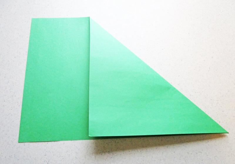 Fold the paper to create a square.