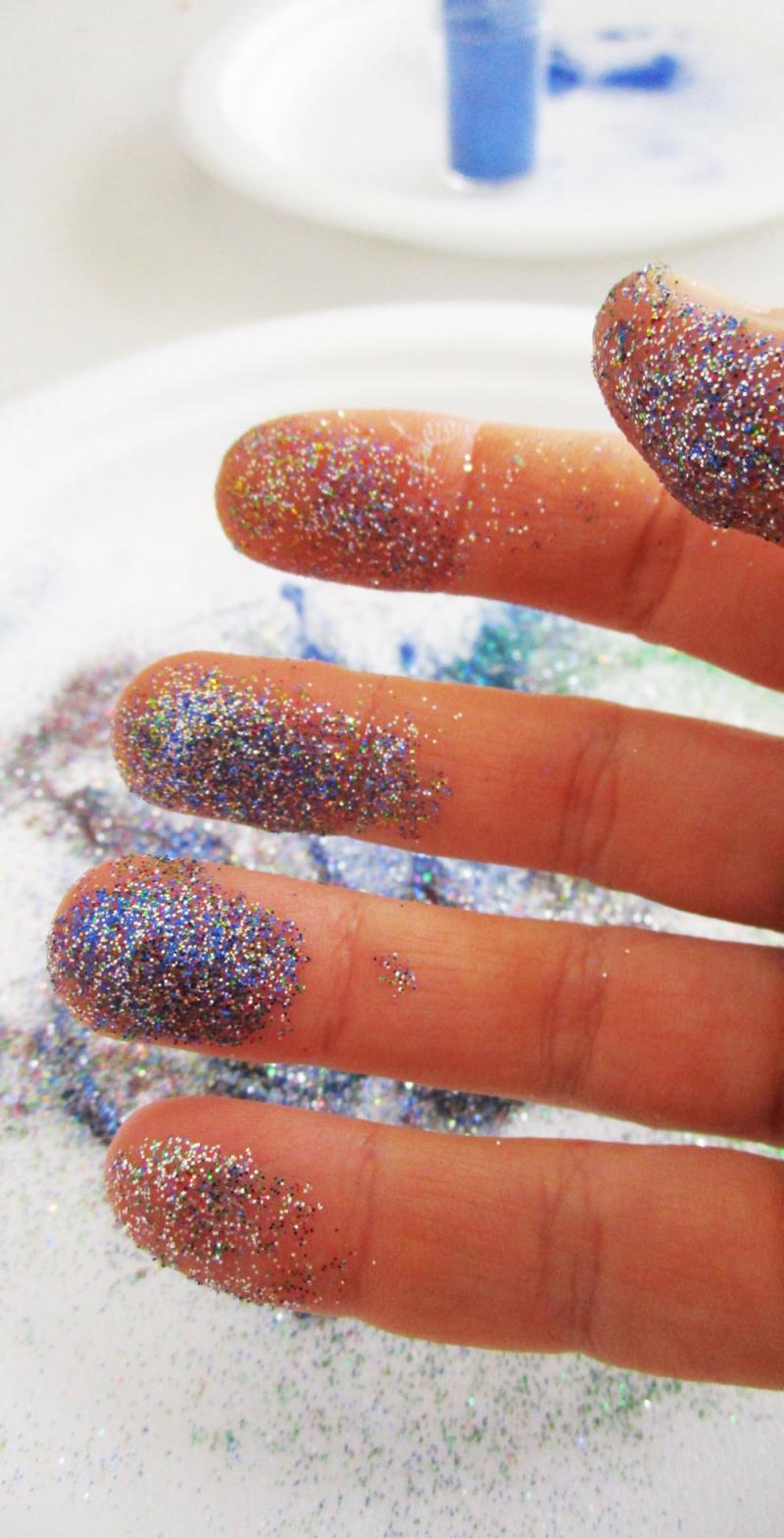 Glitter-covered fingers